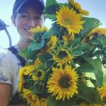 Megan White with sunflowers