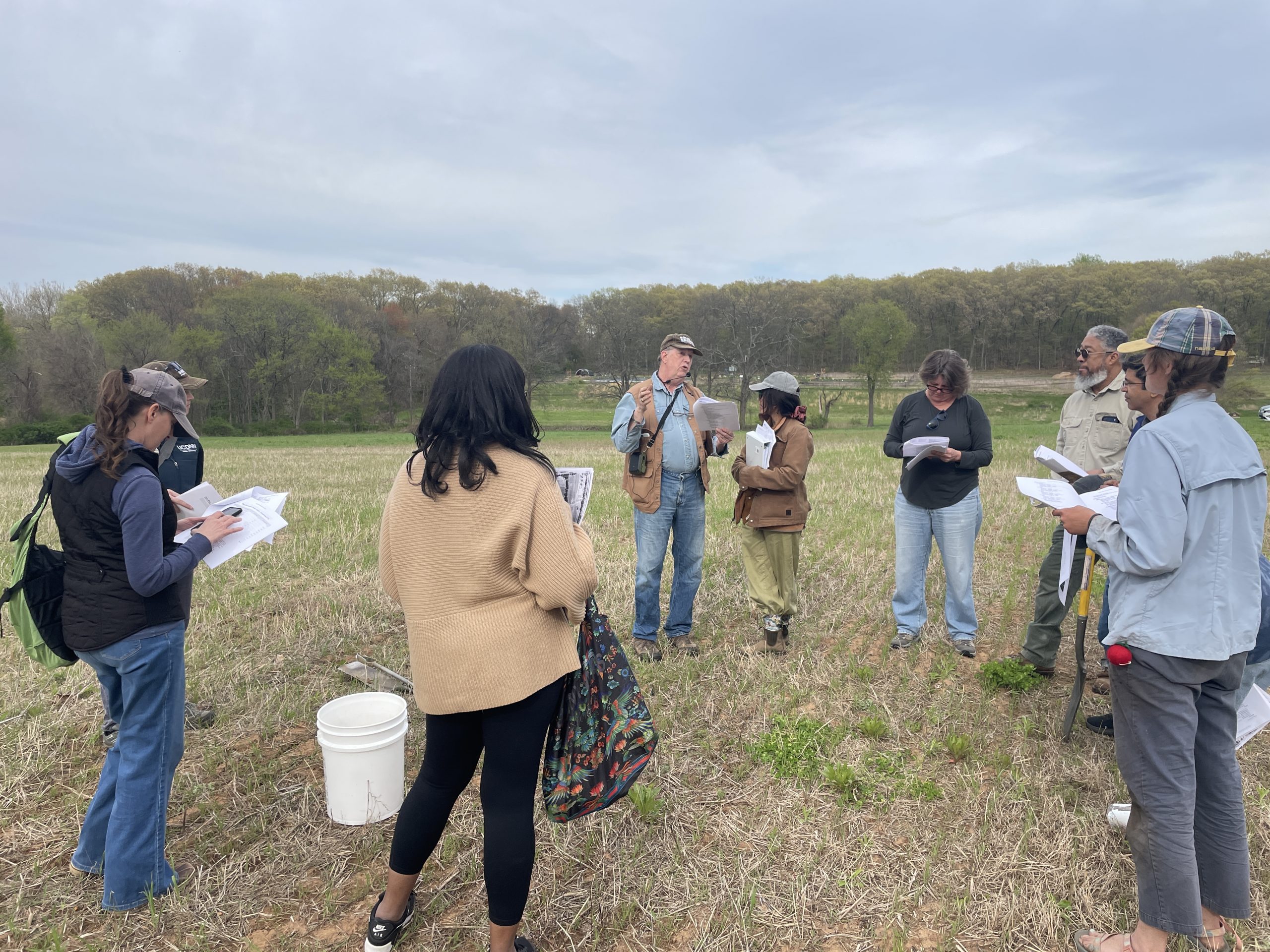 group standing in field